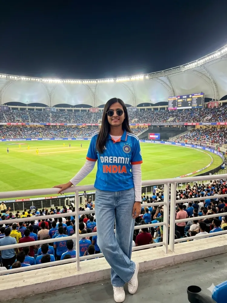 Woman Wearing Team India Cricket Jersey at a Stadium Match